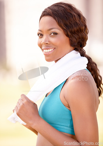 Image of Fitness towel, black woman and portrait with happiness from exercise and sport. Workout, African person and female face feeling healthy and happy from sports training and wellness empowerment