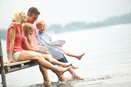 Image of Family, holiday and water with mockup and foot at lake during the summer for travel with love. Child, parent and adventure at river on deck with freedom to relax with space and time for lifestyle.