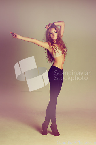 Image of Dance fashion, young woman and portrait of a dancer model with casual style and confidence. Isolated, studio background and dancing pose of a female person with youth, body freedom and natural beauty