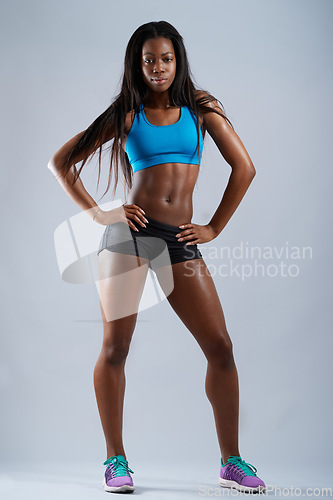 Image of Black woman, studio portrait and body for training, fitness and healthy lifestyle by white background. Girl, model and workout fashion with posture, focus or start exercise for wellness by backdrop