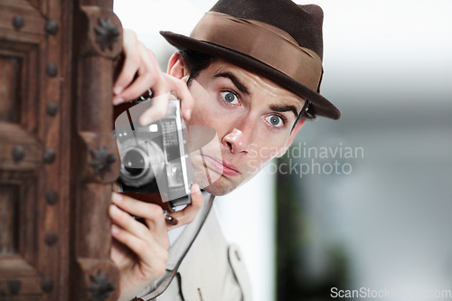 Image of Retro photographer man, street and camera on investigation, inspection or suspicious journalist job in city. Private investigator, secret spy or vintage paparazzi with surprise for surveillance intel