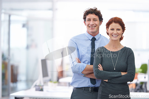 Image of Happy, pride and portrait of business people with arms crossed at work for partnership and collaboration. Smile, success and a businessman and woman smiling for company confidence and happiness