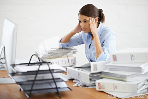 Image of Businesswoman, paperwork and workload stress from office, documents and company employee, tired and work burnout. Female secretary, frustrated and desk of business files, corporate reports and admin