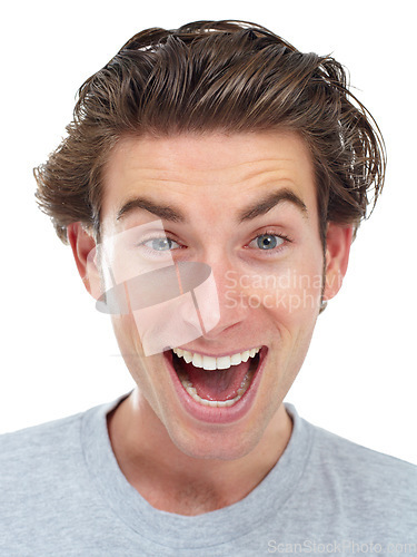 Image of Excited, face and man portrait in a studio with happiness from deal and announcement with smile. Isolated, white background and male person face shouting from good news, winning and surprise