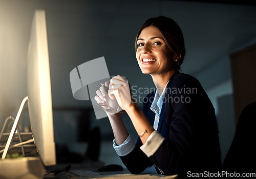 Image of Portrait, smile and businesswoman employee at night or glasses and pc in an office. Corporate, dark and female worker or project manager in the evening or company emails and dedicated on computer