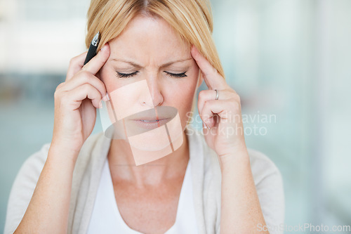 Image of Stress, headache and business woman with pain, sick and exhausted in office workplace. Burnout, migraine and female person with depression, fatigue or tired, vertigo and brain fog, problem or anxiety