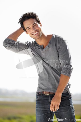 Image of Happy, portrait and a man with fashion in nature to relax, enjoy weekend and break in Colombia. Smile, handsome and a stylish guy with happiness and confidence in clothes while in the countryside