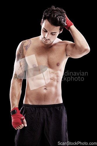 Image of Fight, thinking and a man for boxing training isolated on black background in studio. Serious, idea and a professional athlete boxer with ideas and planning a cardio workout for fitness and exercise