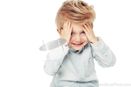 Image of Portrait, kid smile and peekaboo in studio isolated on a white background mockup space. Peeking from hands, boy and face of child playing game, happiness and having fun while enjoying quality time.