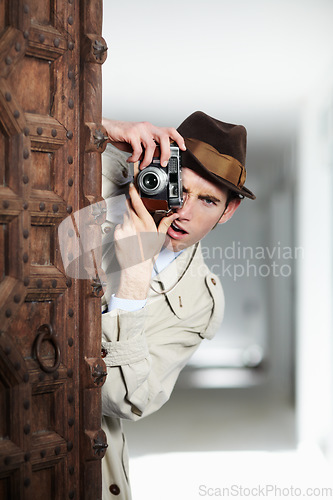 Image of Vintage spy man, street and camera for investigation, inspection and suspicious journalist job in city. Private investigator, secret photographer and retro paparazzi in metro for surveillance intel