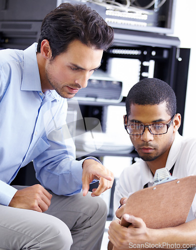 Image of IT, teamwork and men with clipboard in server room for maintenance, inspection and fixing. Checklist, network technicians and tech support for cybersecurity, information and help in data center.