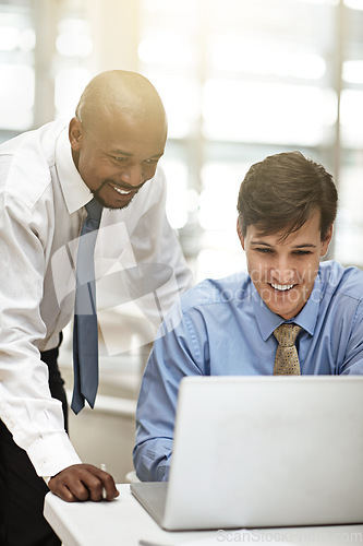 Image of Business, smile and men with a laptop, conversation and planning for a new project, online reading and teamwork. Employees, happy coworkers and staff with technology, collaboration and partnership