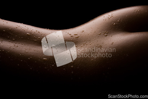 Image of Water drops, back and dark studio person with sexy seductive body, creative sensual shadow or erotic sexual art. Sweat, naked wet skin or closeup silhouette of nude model isolated on black background