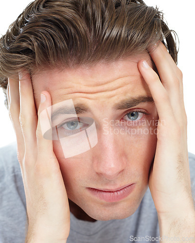 Image of Man, depression and hands in studio with thinking, mental health problem and frustrated by white background. Closeup face, sad student and lost with anxiety, scared and depressed with stress on mind