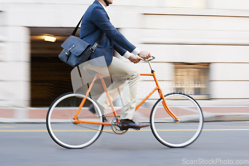 Image of Bicycle, cycling and legs of business man on a road riding to work or appointment in a street. Carbon footprint, travel and shoes of male on bike traveling in a city on eco friendly transportation