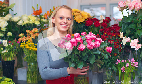 Image of Flowers, portrait of happy woman with bouquet and florist in greenhouse or small business. Eco friendly or green garden, floral gift and female person working at plant nursery or sustainable market