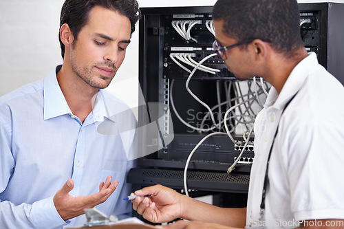 Image of Server room, man or technician with clipboard for technology in cyber security, software glitch or hardware. Network, database or contract with an engineer talking about tech support or internet help
