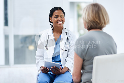 Image of Women, patient and doctor with a tablet, consultation and conversation for diagnosis, cure and treatment. Medical professional, employee and female person in a hospital, technology and discussion