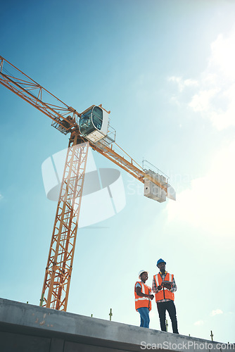 Image of Building roof, tablet and engineer team talking about construction vision, development or architecture. Black woman and man outdoor for engineering, innovation or safety discussion with sky mockup