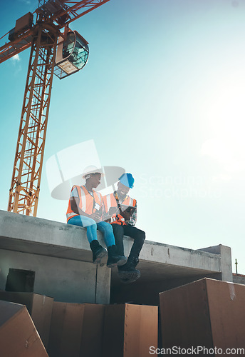 Image of Tablet, engineer and talking on building roof at construction site for vision, development or architecture. Black woman and man outdoor for engineering teamwork, mobile app or safety with sky mockup