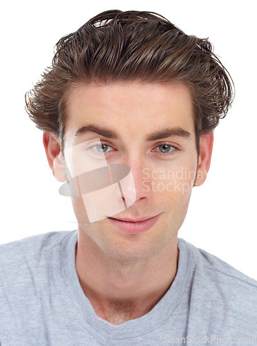 Image of Headshot of man, face and confidence in portrait, young gen z youth isolated on white background. Attractive male model smirk, looking straight ahead with confident expression and pride in studio