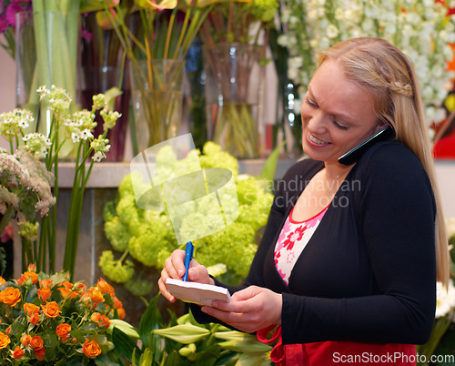 Image of Small business, woman on phone call and in florist writing an order. Flowers or plants, communication or customer service and female worker with smartphone or cellphone with client for a bouquet