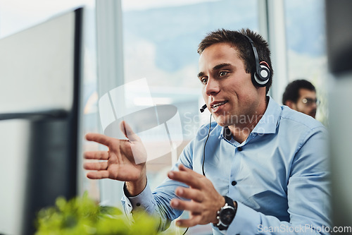 Image of Businessman, call center and consulting on computer in customer service, support or telemarketing at office. Man employee, consultant or agent talking on PC for online advice or help in contact us