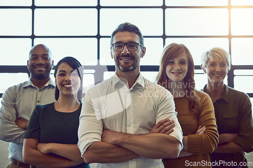 Image of Confidence, crossed arms and portrait of a team in the office for unity, collaboration or teamwork. Happy, diversity and group of business people with success, support and leadership in the workplace