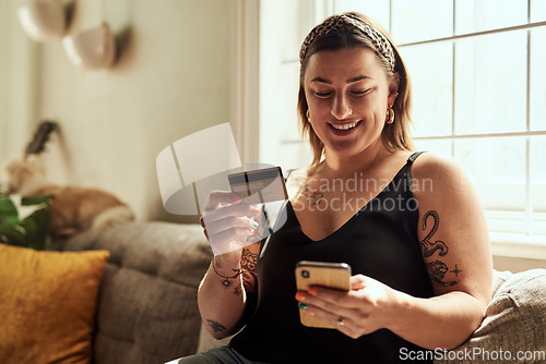 Image of Phone, credit card and woman on sofa online shopping, e commerce and fintech payment, loan or happy finance. Person on couch typing banking information on mobile app for home transaction and finance