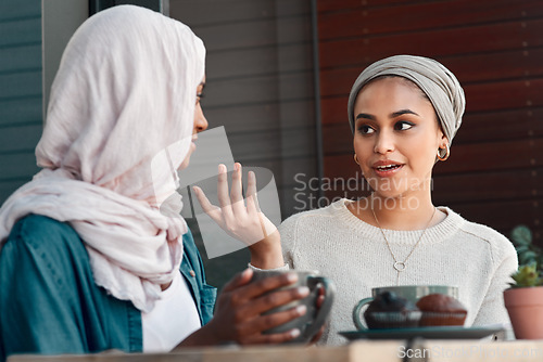 Image of Gossip, coffee and smile with Muslim women in cafe for conversation, food and social. Friends, relax and culture with arabic female customer in restaurant for discussion, happiness and meeting