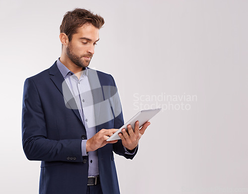 Image of Business man with tablet, technology or corporate communication isolated on studio background. Internet, connectivity or networking professional, male worker or check email for career on mockup space