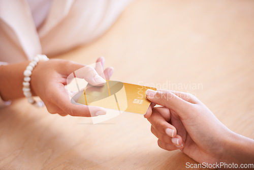 Image of Payment, service and hands of people with a credit card to pay for a booking or reservation. Retail, shopping and a woman giving for transaction, sales and paying for services at a store or reception