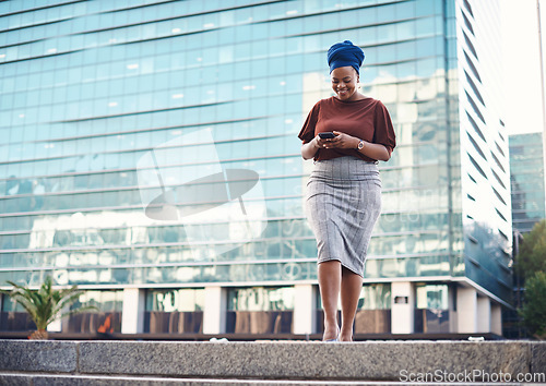 Image of Black woman, phone and city travel walking of a employee with happiness and social network. African female person, mobile communication text and networking with tech and internet by urban streets