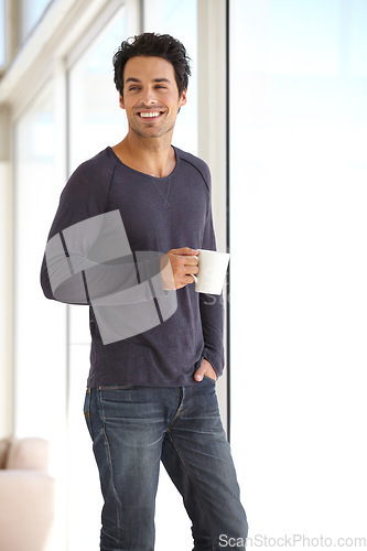 Image of Morning, coffee and a man with a smile while thinking about a plan, idea or peace in a house. Happy, window and a person with a tea drink at home for happiness, break and relaxing in an apartment