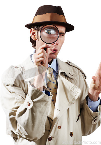 Image of Private investigator, magnifying glass and portrait of man in studio for detective, searching and looking. Spy, investigation and male person with magnifier for secrets, information and mystery clue