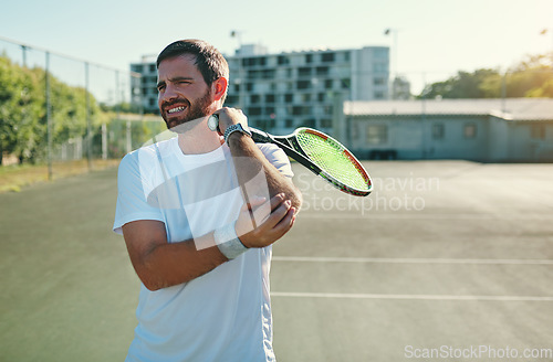 Image of Tennis, injury and joint pain by man at court for fitness, training or workout with problem. Sports, accident and male player with arthritis and injured arm, osteoporosis and muscle or fibromyalgia