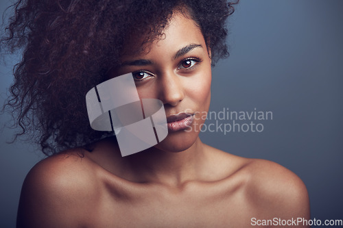 Image of African woman, curly hair and studio portrait with makeup, cosmetics and health by dark background. Girl, model and wellness with skincare, natural aesthetic and glow on face with beauty by backdrop