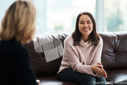 Image of Therapy, happy women have a conversation on sofa and speaking or talking with a psychologist. Mental health or communication, support or consulting and people on couch have a discussion together