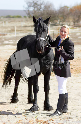 Image of Horse rider, trainer portrait and woman on equestrian training and competition ground. Outdoor, female competitor and show horses stable with a girl stroking an animal before riding with helmet