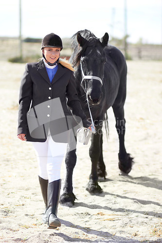 Image of Walking, sports and portrait of woman and horse for equestrian, competition and celebration. Happy, smile and animal show with female jockey and stallion for achievement performance and training