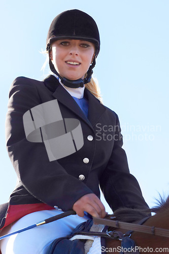 Image of Equestrian, happy and portrait of woman on horse for competition, training and show. Performance, riding and fitness with female jockey on stallion for animal, athlete and contest event