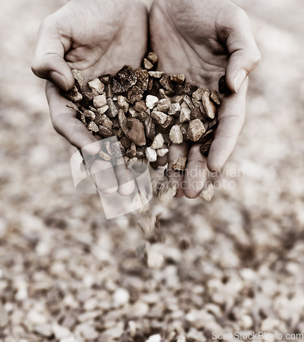 Image of Earth, ground and hands holding gravel closeup outdoor in nature for adventure or to explore in monochrome. Stones, fingers and scoop with a person lifting dirt outside in a natural environment