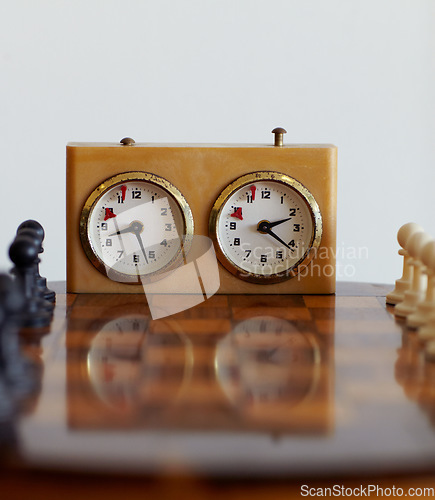 Image of Chess sport, timer and clock for challenge isolated on a white background mockup in studio. Game, board and countdown for time, alarm and tactical competition for strategy, logic and vintage watch.