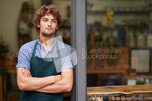 Image of Door, arms crossed and thinking with man at cafe restaurant for small business, coffee shop or waiter. Entrepreneur, open and retail with male barista at restaurant for diner, store and food industry