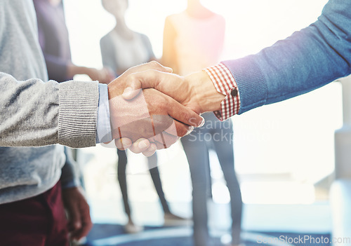 Image of Closeup, hand shake and agreement for partnership in office with welcome, onboarding or b2b collaboration. Men, business and shaking hands for hiring, recruitment and congratulations in workplace