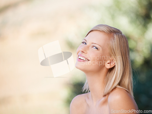 Image of Portrait, woman and natural beauty or skincare, wellness and dermatology treatment on outdoor blurred background. Girl, happy and spa, facial care or confidence, fresh skin glow and bokeh mockup