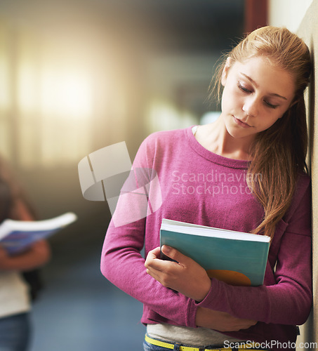 Image of Girl, sad and school bullying with book, anxiety and depression from problem with students at academy. Young, teenager and upset with notebook and kids gossip in hallway, education and wall mock up