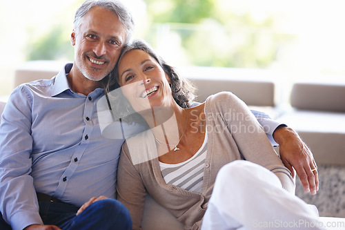 Image of Portrait, smile and senior couple on a couch, love and relationship with joy, home and happiness. Face, mature man and old woman on a sofa, retirement and cheerful with marriage, bonding and loving