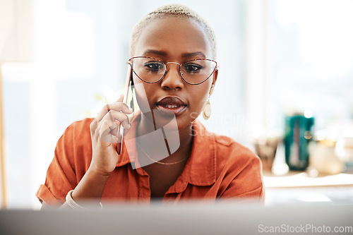 Image of Phone call, office and business black woman on laptop working on online report, web review and networking. Corporate, communication and serious female worker talking in discussion and conversation