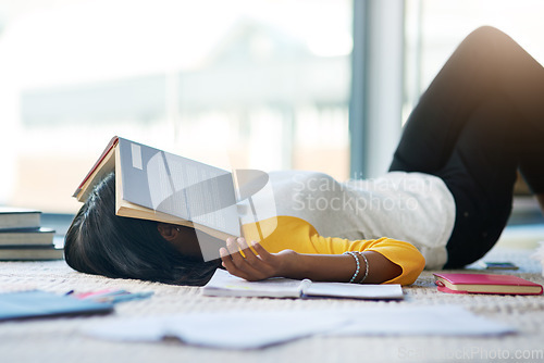 Image of Books, tired student and woman sleeping after studying for college, university research or academy school project. Education study, knowledge and female person relax, fatigue and sleep on home floor